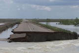 An 'exception amount of rain'  has destoryed this strecth of the Northern Territory's Barkly Highway