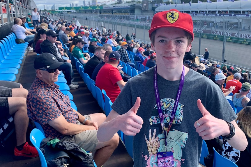 Daniel Ricciardo gives a thumbs up, in the stands of the Australian Grand Prix.