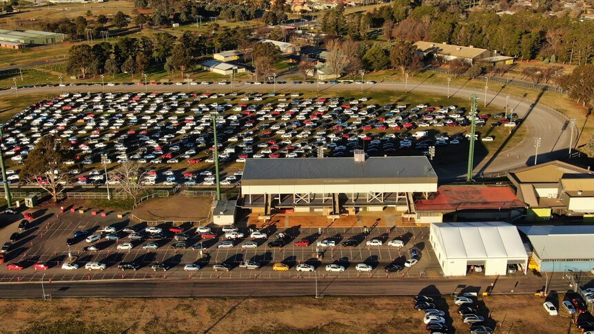 A drone image of cars queing for COVID-19 testing in Canberra 