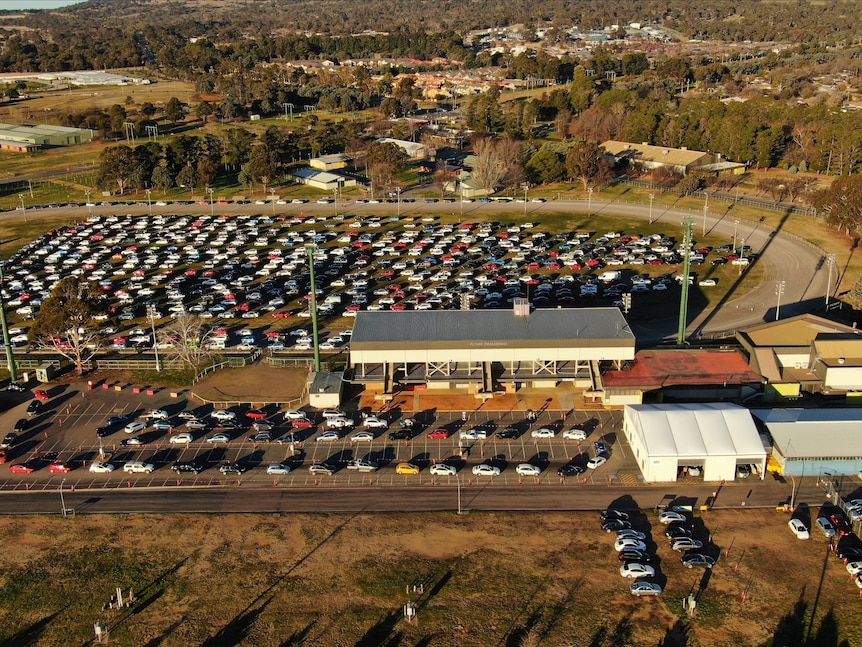 A drone image of cars queing for COVID-19 testing in Canberra 