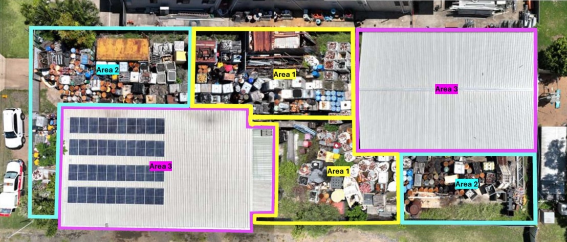 Aerial image of crowded site with waste and containers 