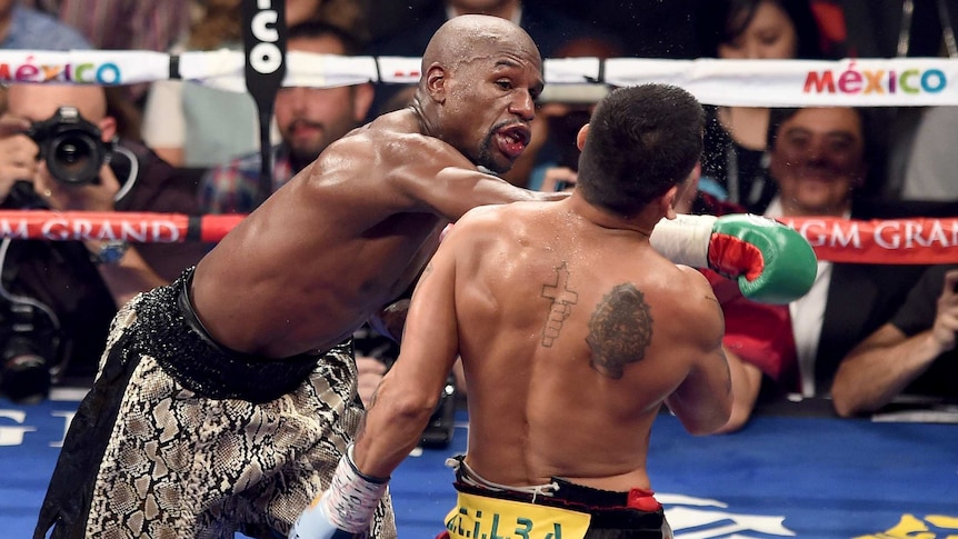 Floyd Mayweather Jr lands one on the chin of Marcos Maidana