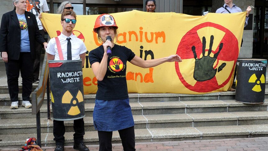 Anti-uranium protesters demonstrate outside the Queensland Government building