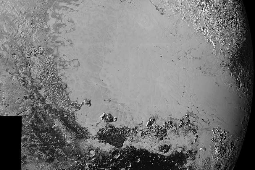 An image of Pluto's surface showing a smooth ice plain