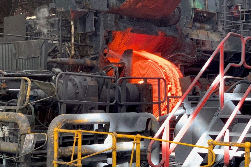 Inside a factory where steel is being made.