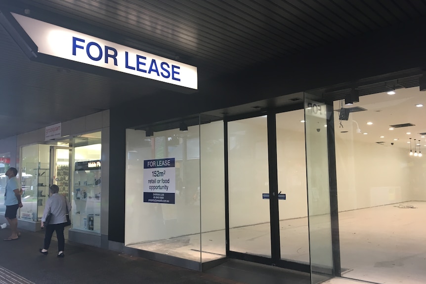 A shop sits empty and for lease on a Darwin shopping strip.