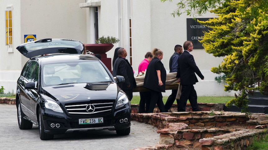 Pallbearers carry coffin of Reeva Steenkamp