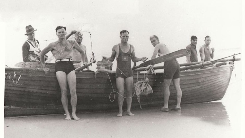 A group of men from Kirra Surf Life Saving Club hunt a killer shark in 1937