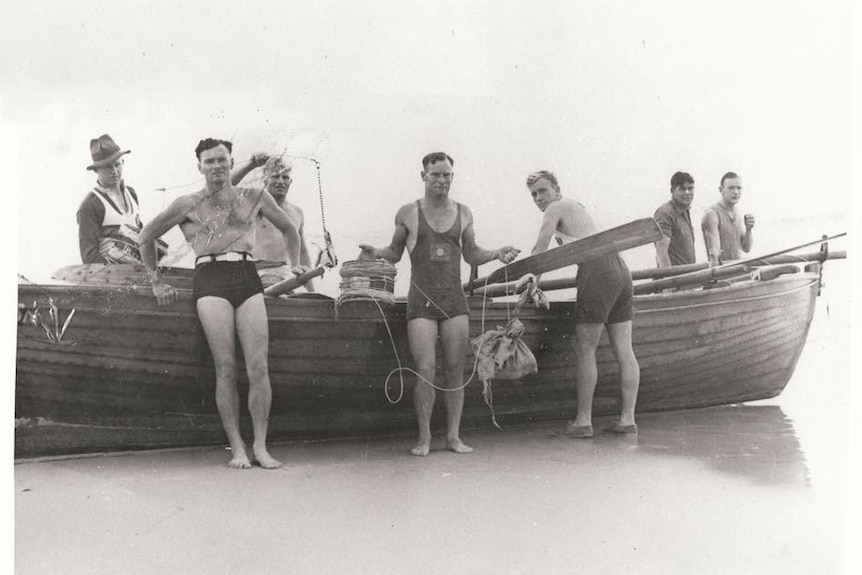 A group of men from Kirra Surf Life Saving Club hunt a killer shark in 1937