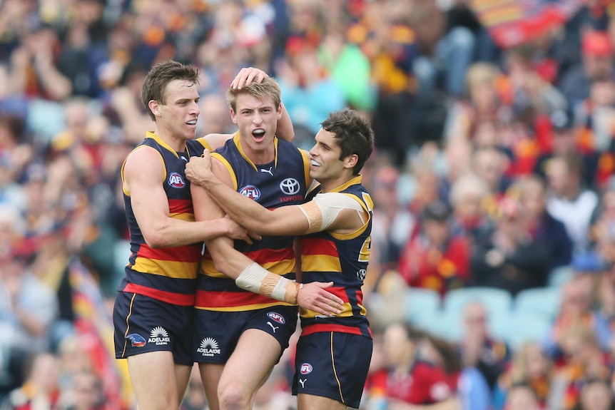 Daniel Talia celebrates a Crows goal