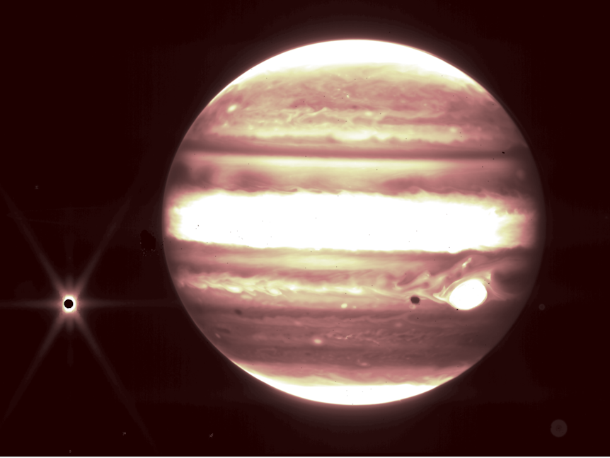 Jupiter and its moon Europa are seen through the James Webb Space Telescope