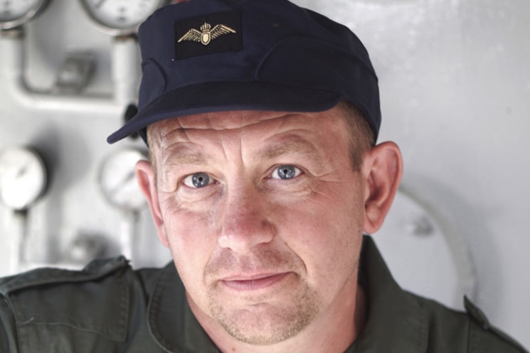 Headshot of Peter Madsen in a Spacelab uniform