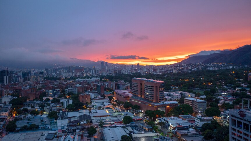 The sun setting over Caracas