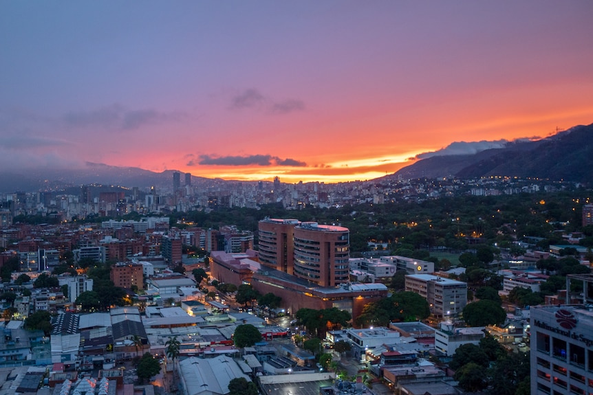 The sun setting over Caracas