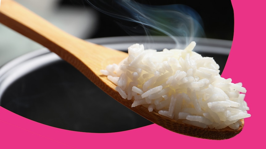 Wooden spoon with freshly cooked rice, depending on what you are making it might not need to be washed before use.