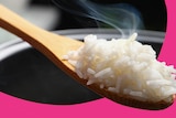 Wooden spoon with freshly cooked rice, depending on what you are making it might not need to be washed before use.
