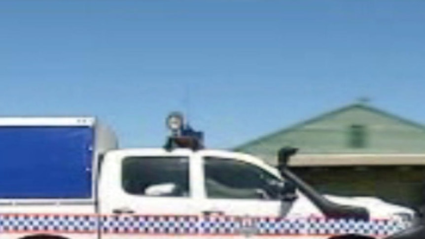 A police car patrols the streets of Yuendumu.