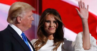 Melania Trump stands with Donald Trump