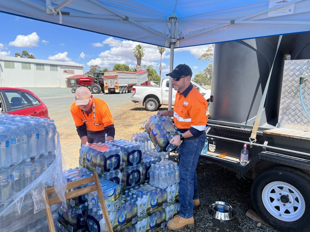 coliban workers unloading water bottles