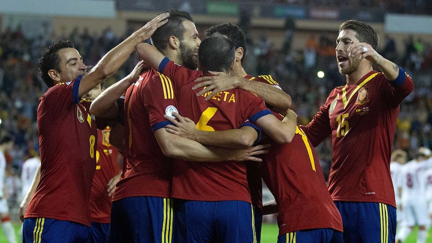 Spain's Alvaro Negredo is congratulated by team-mates after scoring the opener against Georgia.