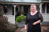 Lizzie Sabo stands outside her home and bed and breakfast near Stanthorpe, June 2021