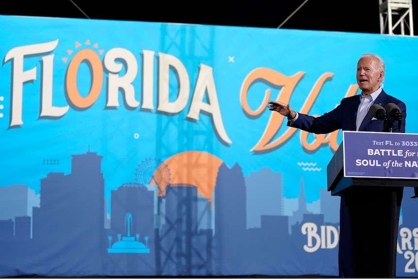 Democratic presidential candidate former Vice President Joe Biden speaks at a drive-in rally