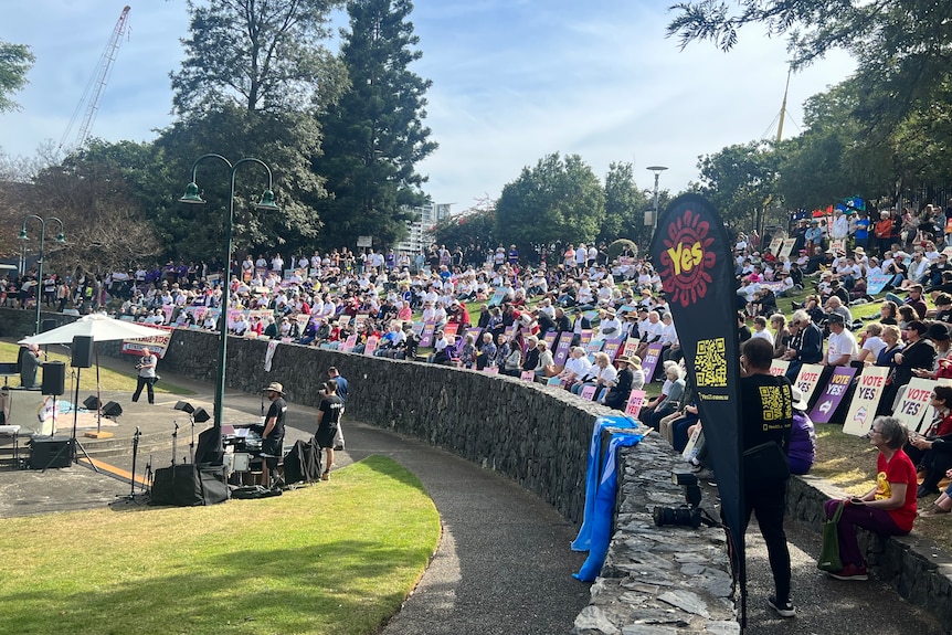 A large crowd is gathered at Brisbane's Roma Street Parkland at the Come Together For Yes event