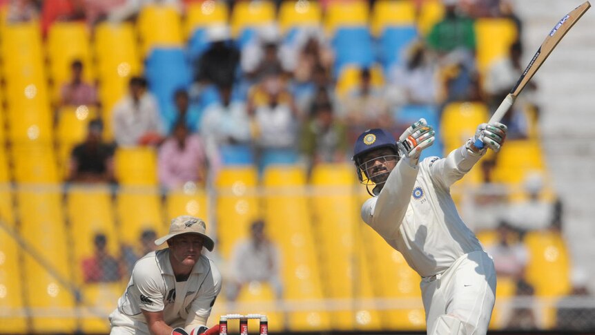 Harbhajan Singh plays a lofted drive in his career-best innings of 69.