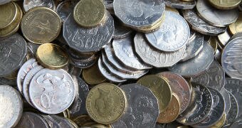 A pile of Australian coins on a table.