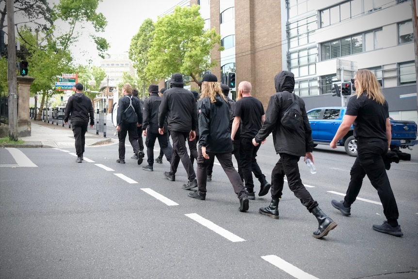 Men dressed in black at North Sydney after Australia Day police operation