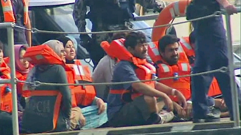 Asylum seekers being transferred to Christmas Island on August 4, 2011.