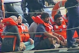 Asylum seekers being transferred to Christmas Island on August 4, 2011.