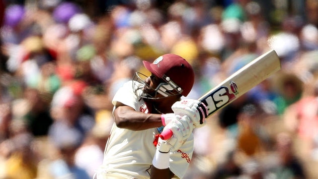 Third ton: Dwayne Bravo rode his luck to compile an invaluable 104 on the opening day in Adelaide.