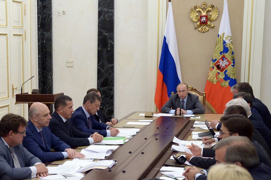 Vladimir Putin chairs meeting at Kremlin