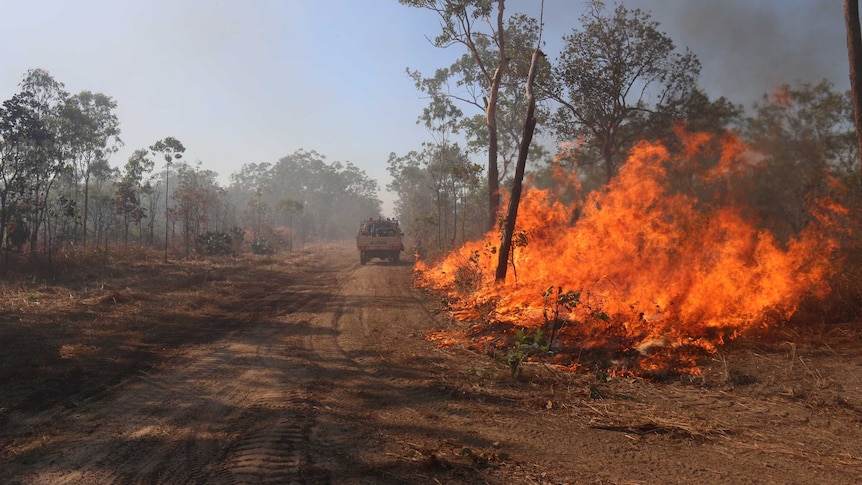 Firefighters back burning