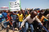 Striking platinum miners march in South Africa