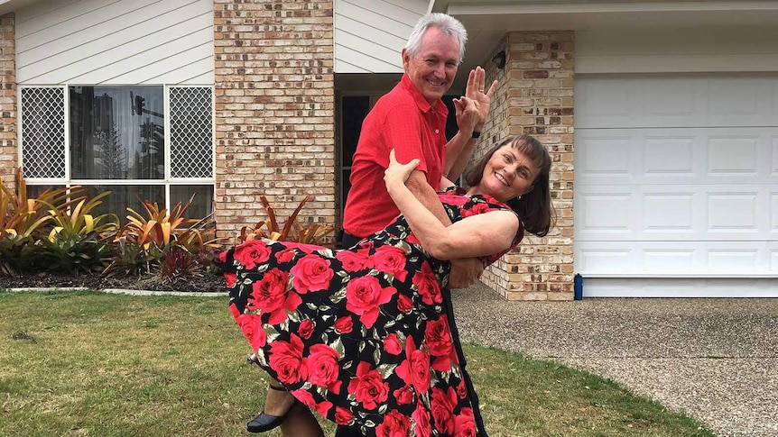 Rock and roll dance teachers Rob and Kathy Llewellyn outside their Burleigh Heads home