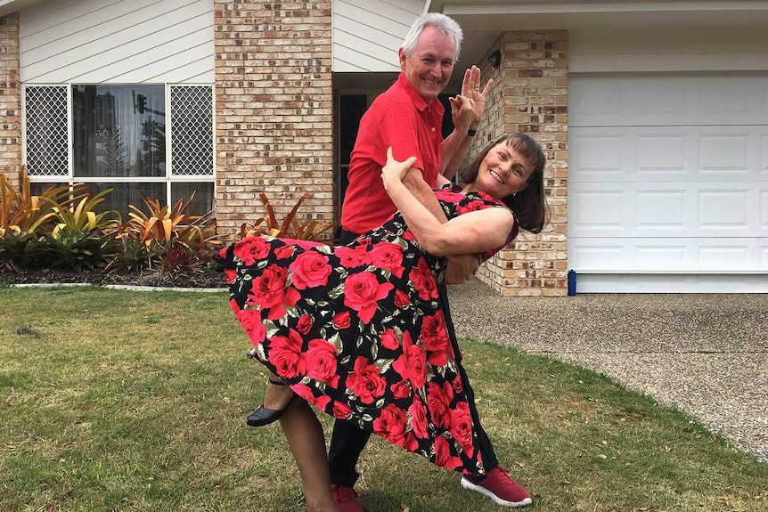 Rock and roll dance teachers Rob and Kathy Llewellyn outside their Burleigh Heads home