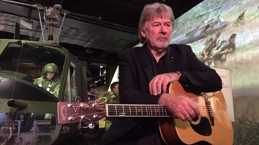 John Schumann and his guitar.