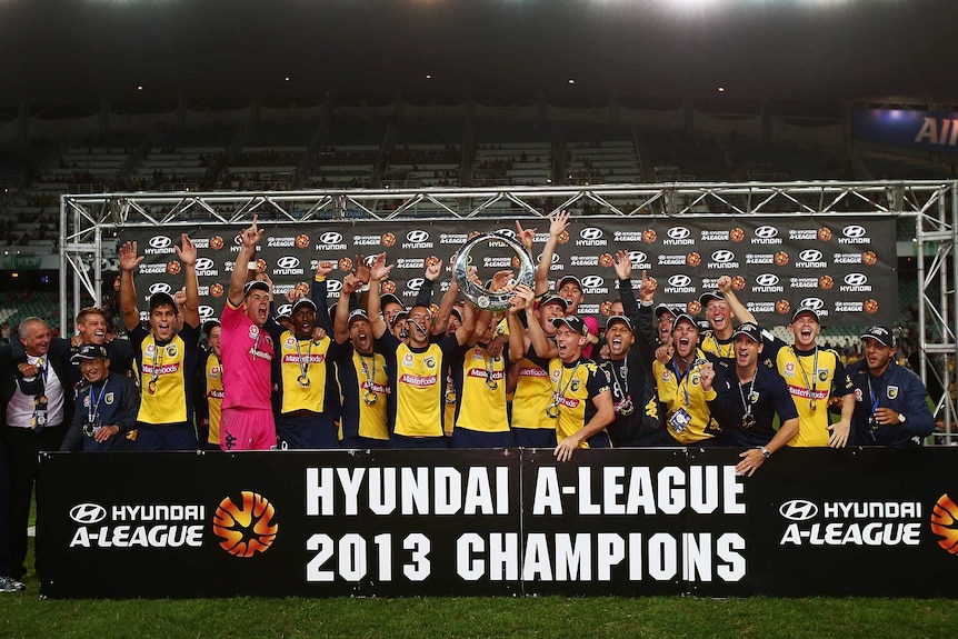 The Mariners celebrate winning the 2013 A-League grand final