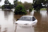 Cars submerged by floodwaters in Cairns.