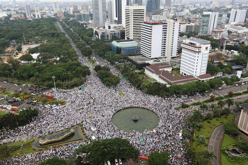 A large crowd of at least 150,000 gathers in Indonesia's capital city of Jakarta