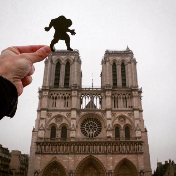 A photo of the Notre Dame with a hunchback cut out