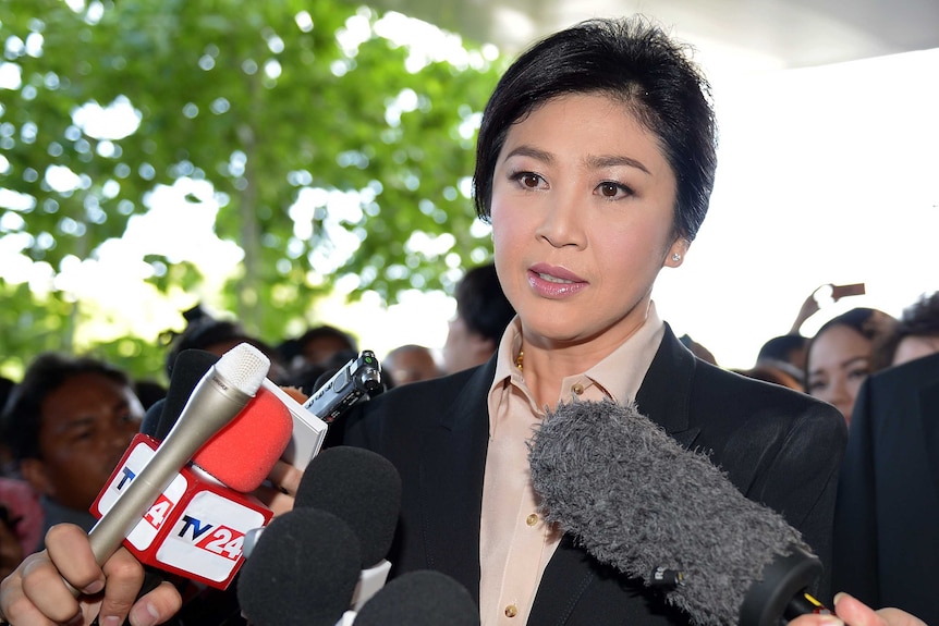 Former Thai prime minister Yingluck Shinawatra arrives at court