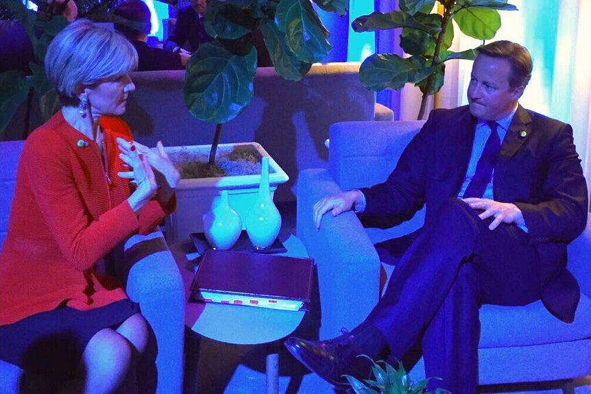 Julie Bishop talks with David Cameron.