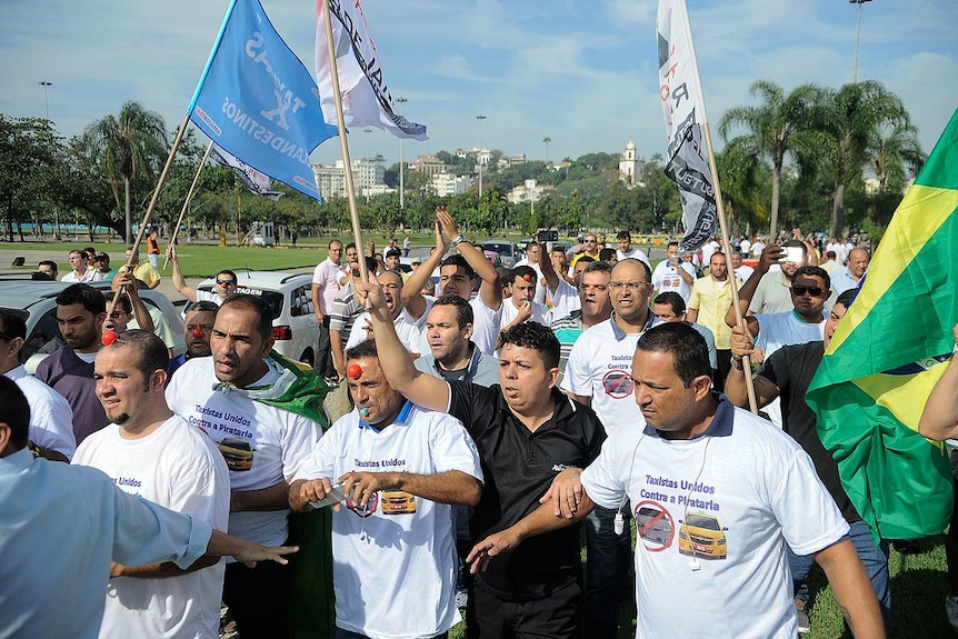 Taxi drivers in Rio de Janeiro demonstrate against Uber.
