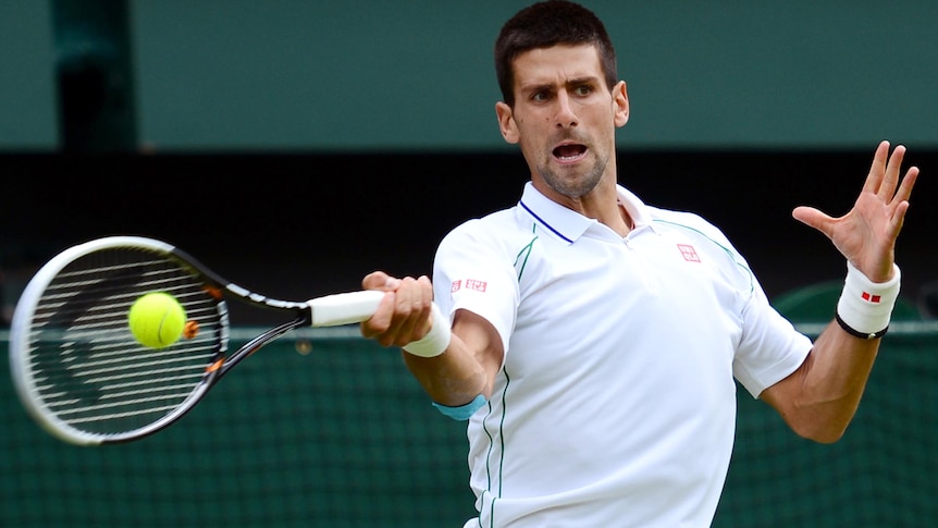 Novak Djokovic plays a forehand during his first round win at Wimbledon.