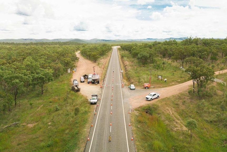 Drone photo of check point with along rural road.