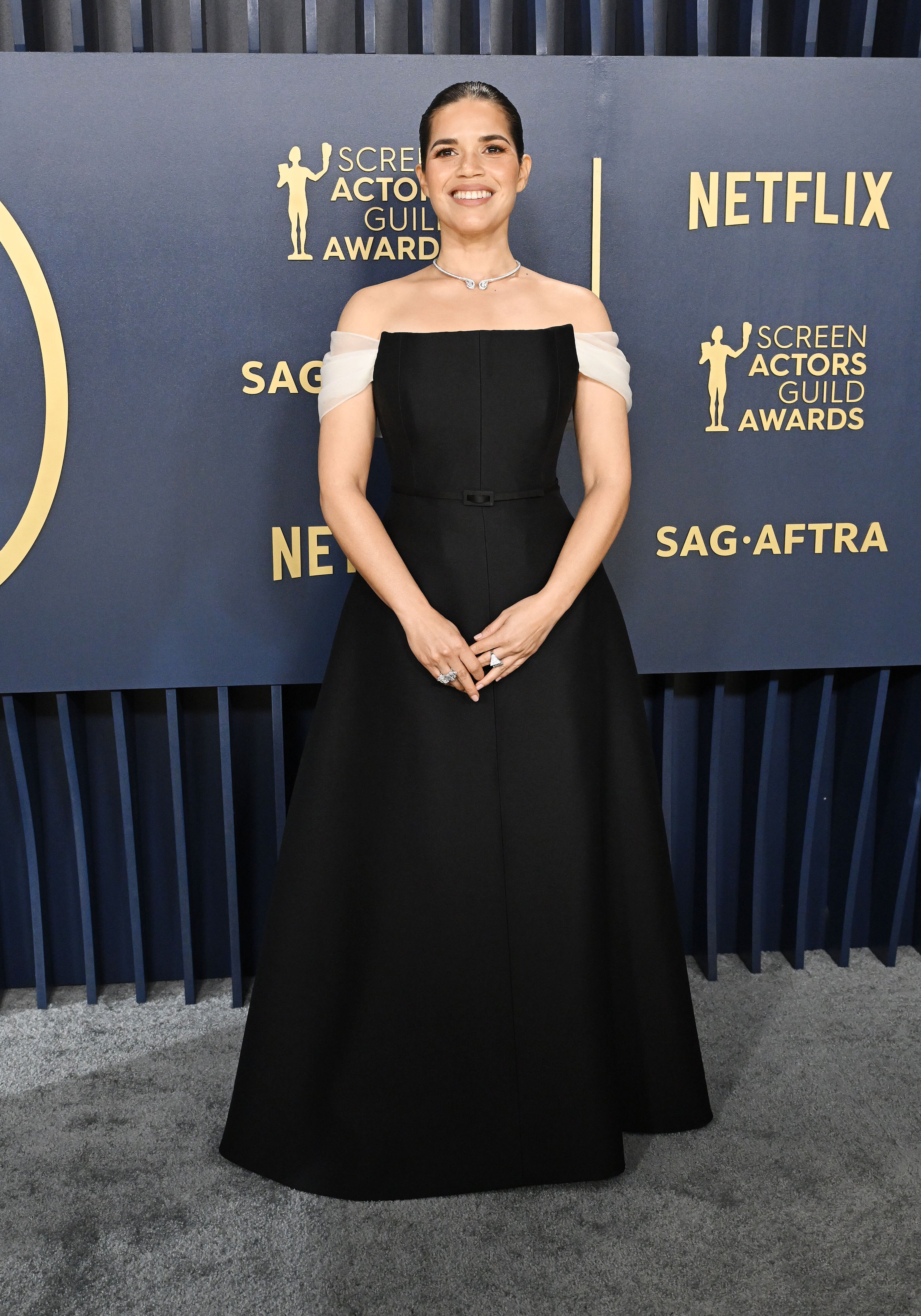 A woman in black flowy dress