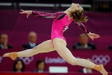 Lauren Mitchell competes in the gymnastics floor exercise final.
